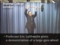 Professor Eric Laithwaite gives a demonstration of a large gyro wheel